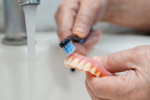 Permanent Implant Dentures in Sterling Heights, MI | The Downsides of Traditional Dentures